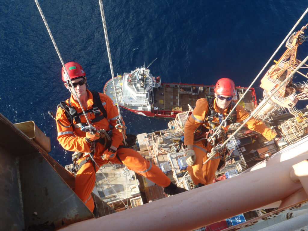 Rope access technicians at work